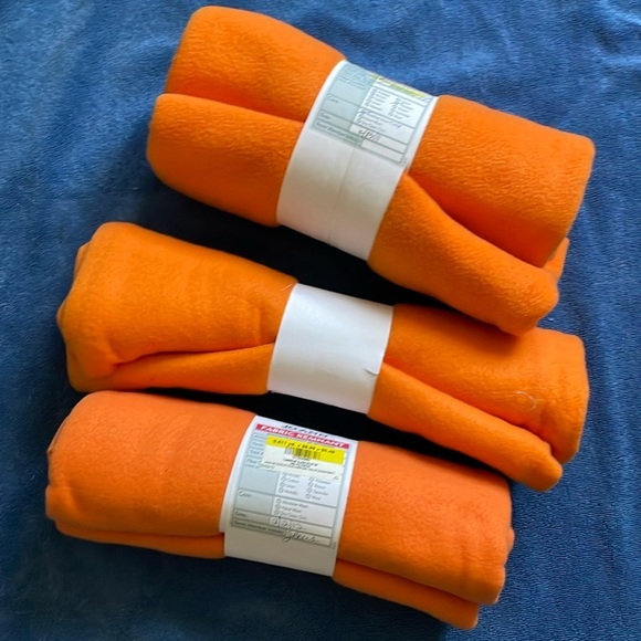 Other - Fabric remnants of orange flannel